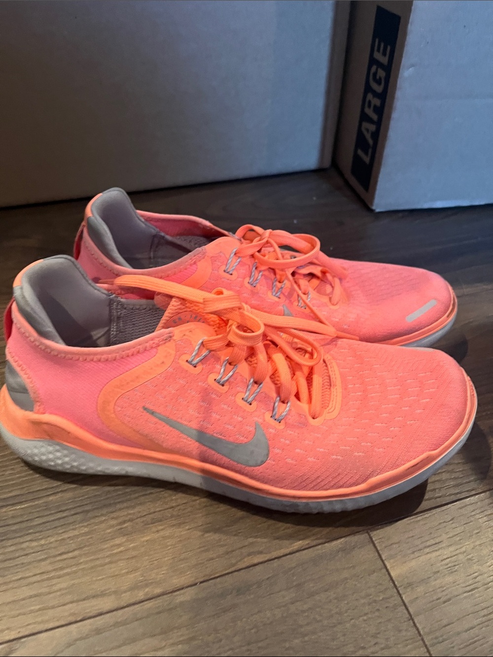 Nike Women’s Coral-Orange Knit Running Shoes